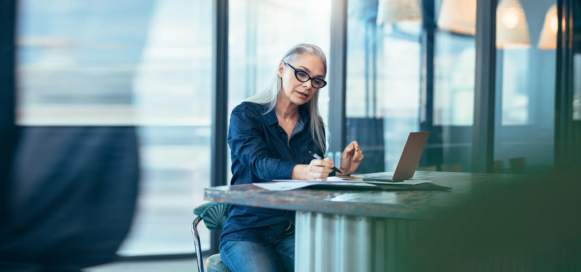 Seasoned female executive at her desk