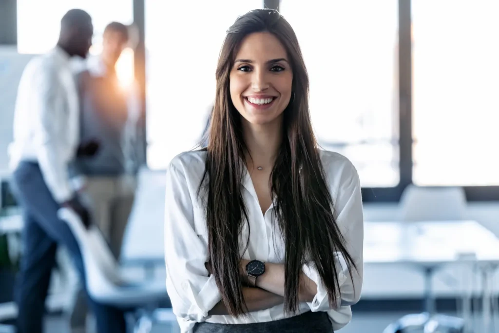 Strong female executive smiling